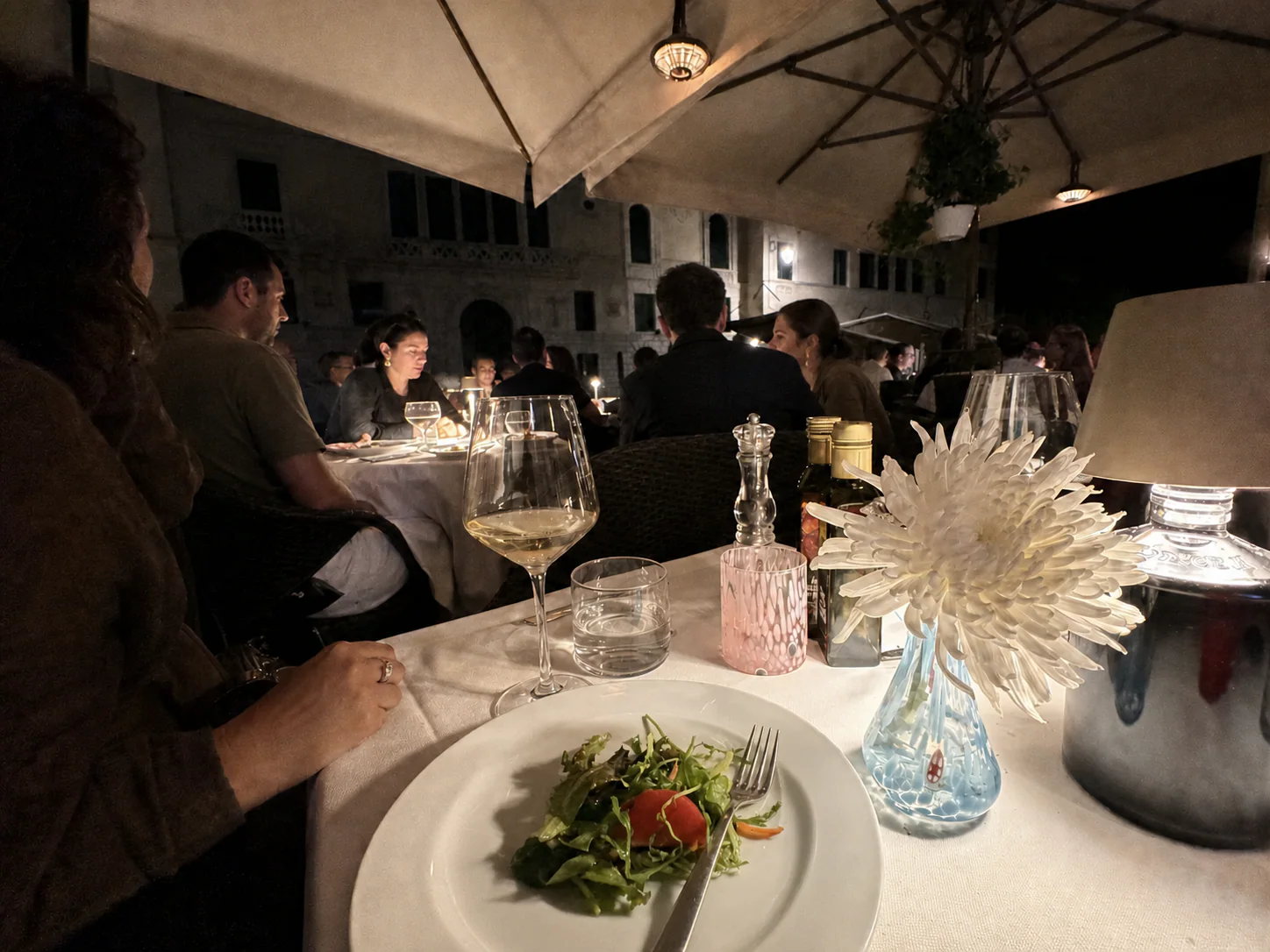 A starter served at the tables in the square, at night